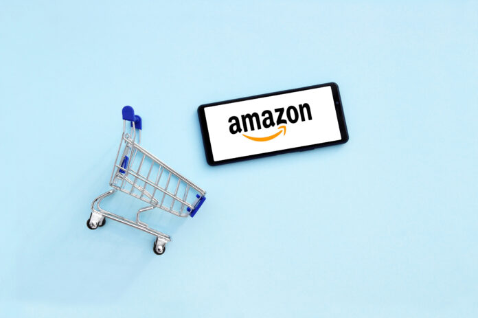 Kharkov,,Ukraine, ,November,12,2020:,Shopping,Cart,With,A,Smartphone