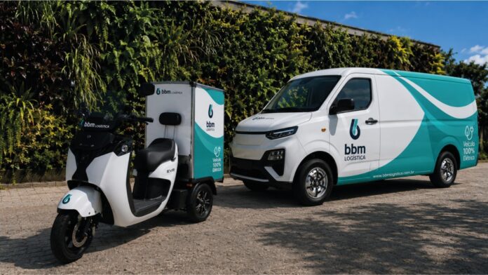 BBM Logística electric delivery van with teal branding parked beside a white electric scooter with a cargo box.