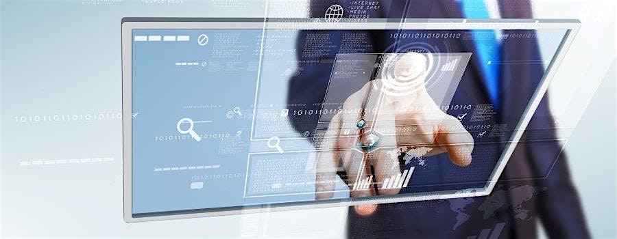 Businessperson touching a translucent holographic touchscreen displaying graphs and data.