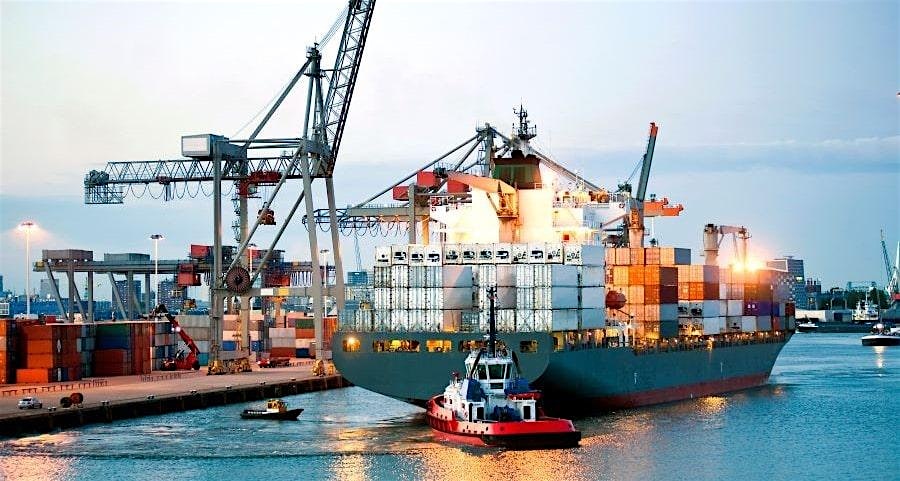 5cb91b33ed6f8469e331f1de7ba47191 ECommerce Update Large cargo ship loaded with colorful containers docked at a busy port with cranes nearby